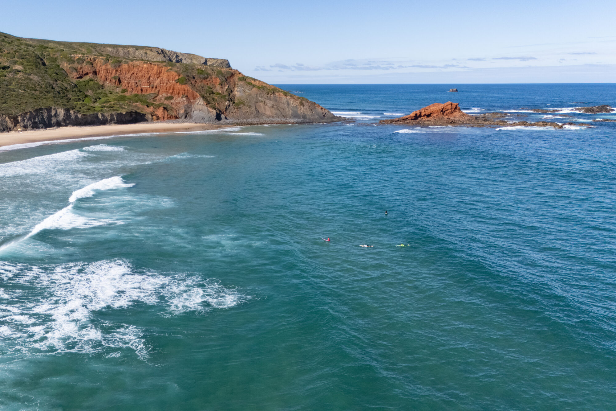 A sheltered turquoise cove on the Algarve west coast
